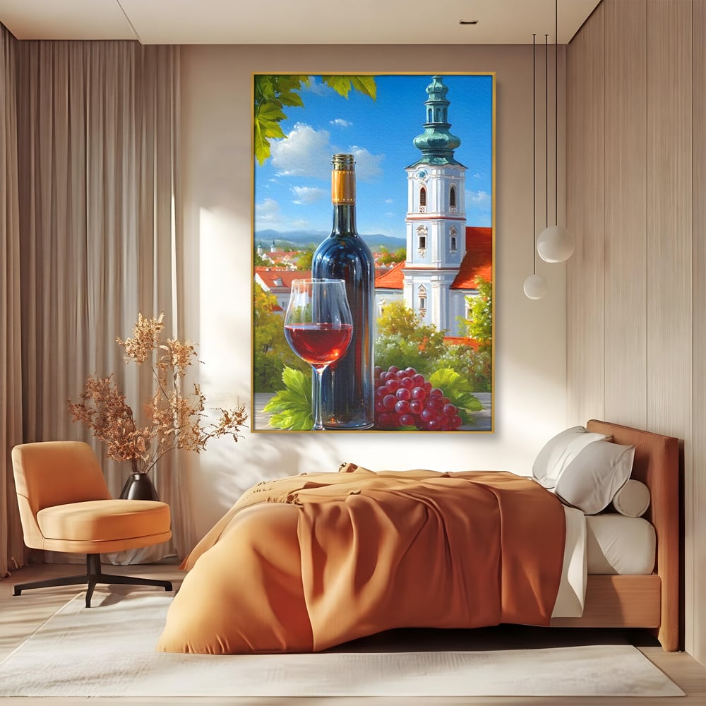 Tablou canvas cu pictura cu sticla de vin si manastire, in rama de aluminiu auriu, pe perete intr-un dormitor